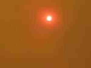 The Sun at Noon in a Haze